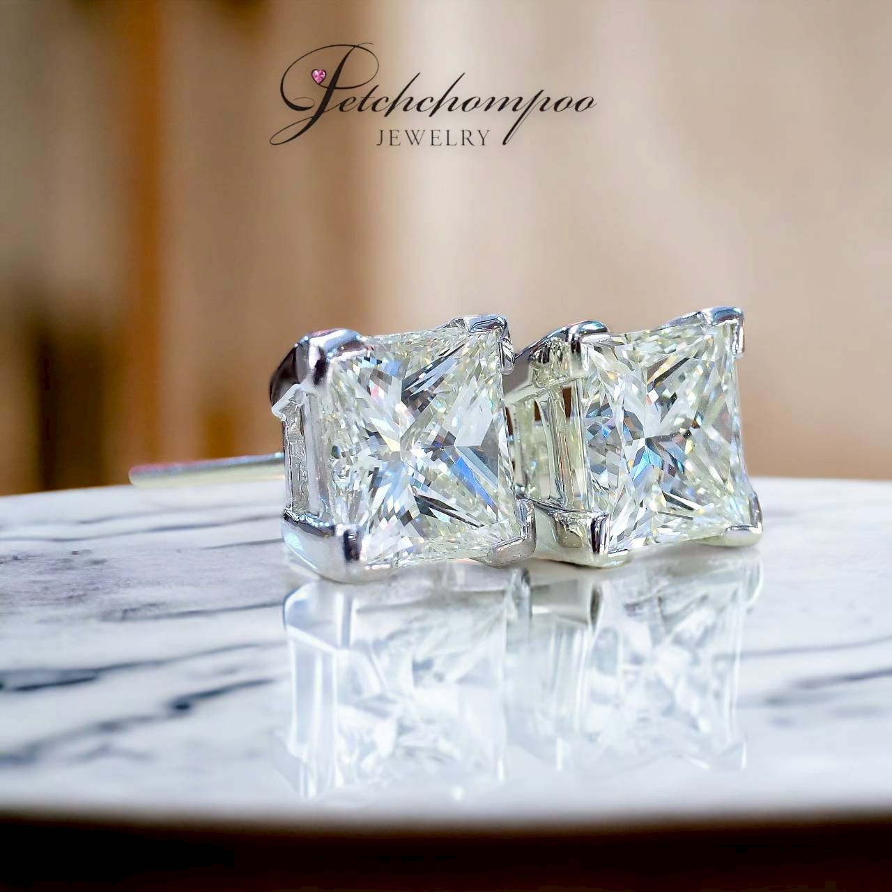 [28562] Princess cut diamond earrings, 2 carats each, HKD certificate. Discount 790,000