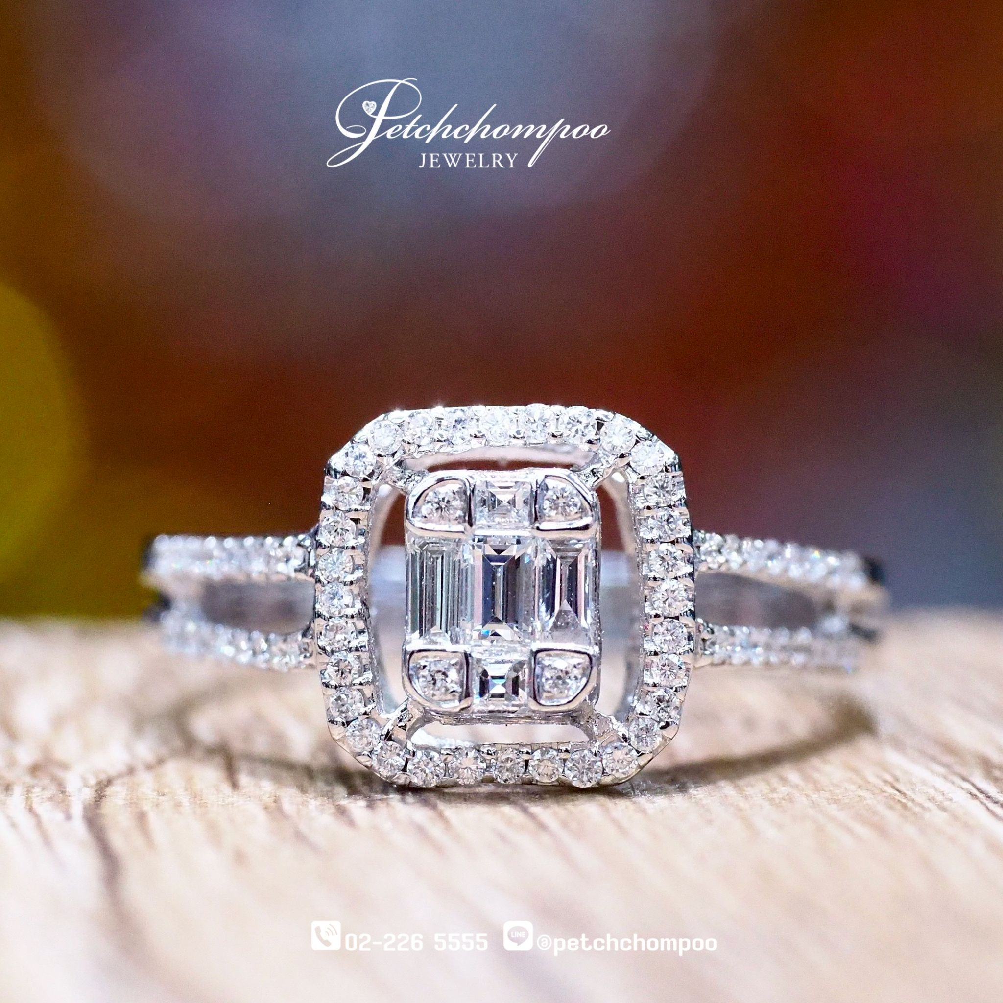 [27772] Emerald cut diamond ring  39,000 