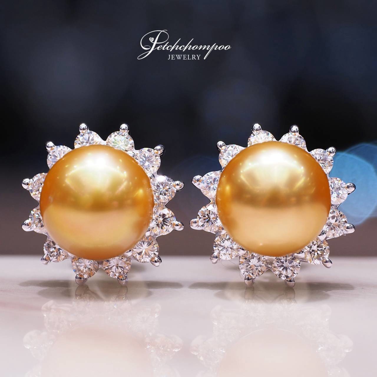 [31176] "The Golden Aura" 11mm South Sea golden pearl earrings, featuring a 2-in-1 design accented with diamonds.  99,000 
