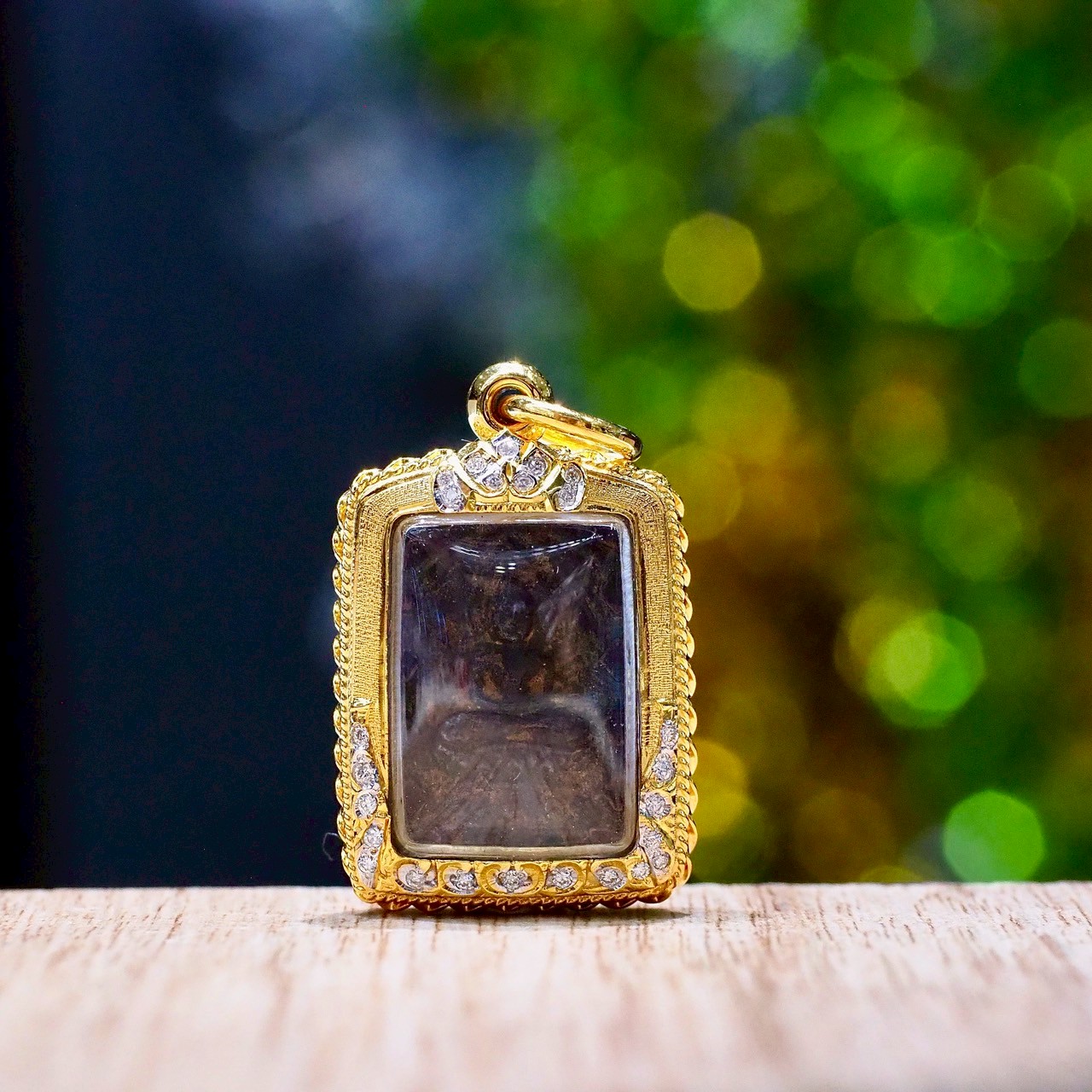 [30053] Luang Pu Suk amulet, Wat Pak Khlong Makham Thao, Prabhamonthon style, lead material, gold frame with real diamonds, with certificate  265,000 