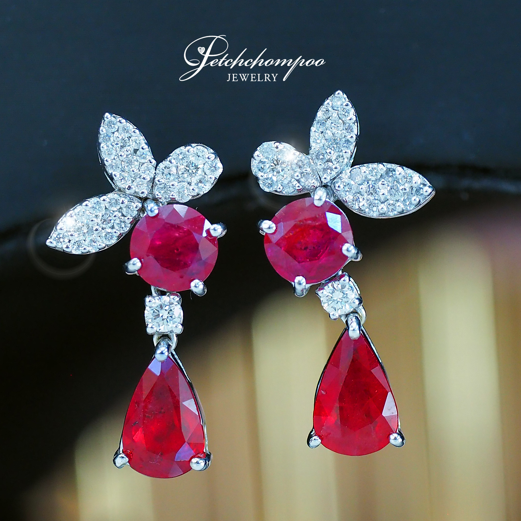 [27064] ruby earrings set with diamonds  59,000 