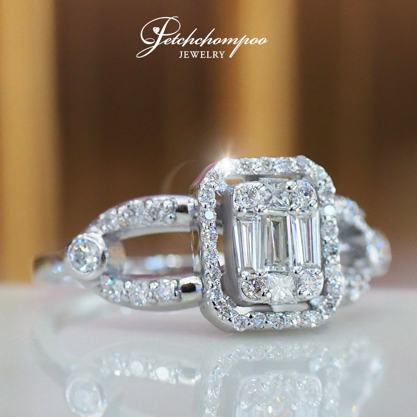 [27049] Emerald cut diamond ring  39,000 