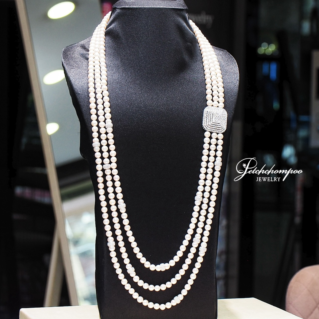 [31024] A three-strand Akoya pearl necklace adorned with 10.07 carats of genuine diamonds.  359,000 