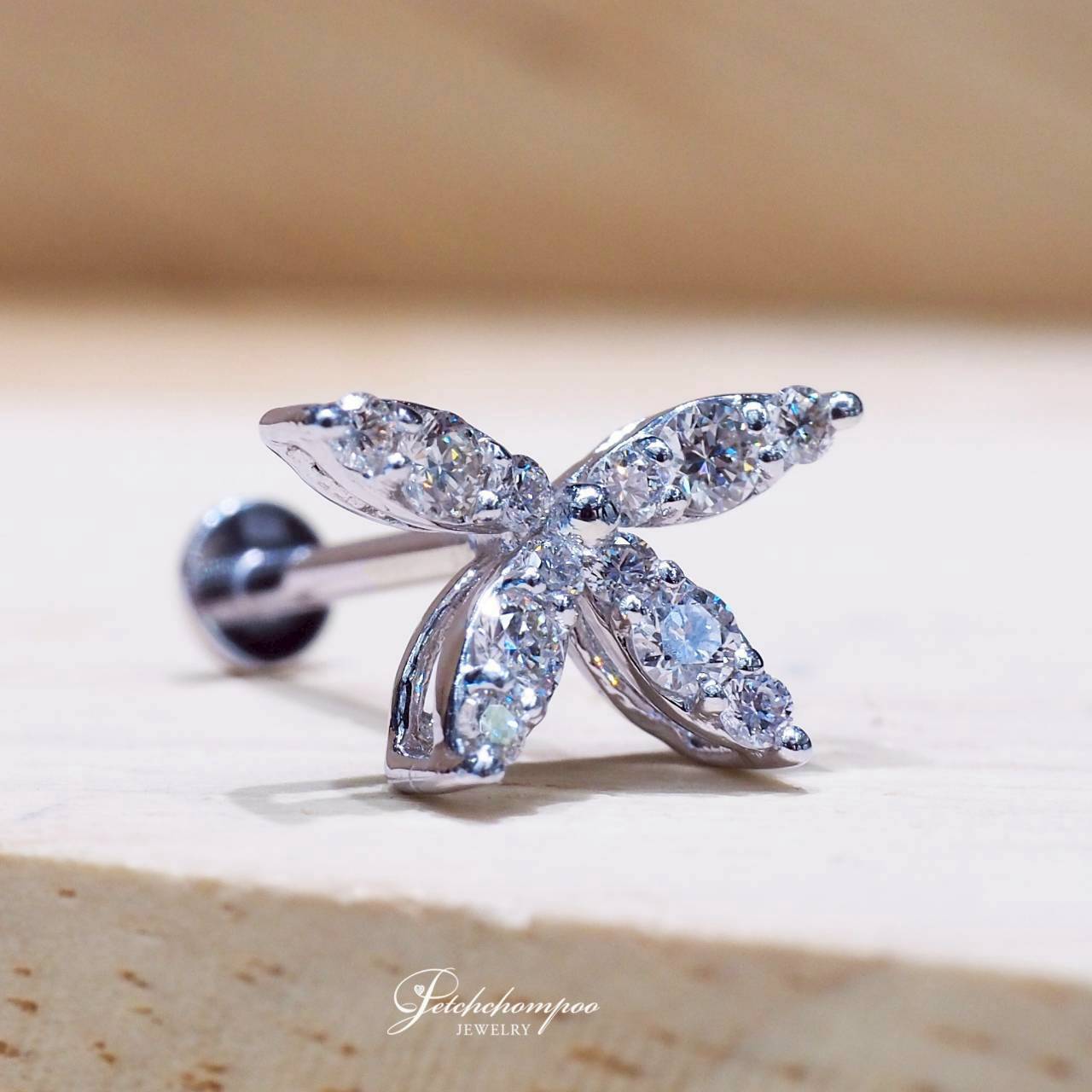 [30851] Flutter Bloom Ear Piercing, 0.20 carat, featuring a delicate, curved butterfly design  17,000 