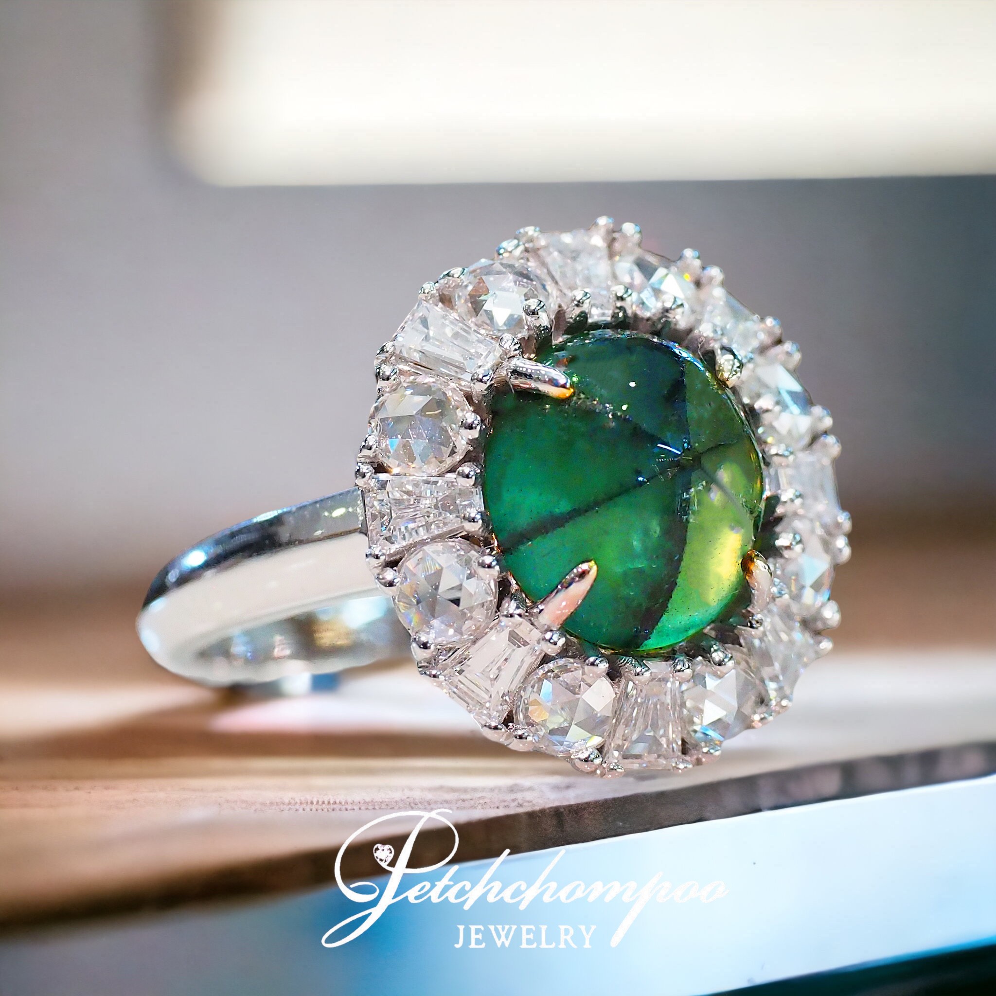 [27539] Colombian Trapiche emerald ring set with diamonds, Sir AIGS.  199,000 