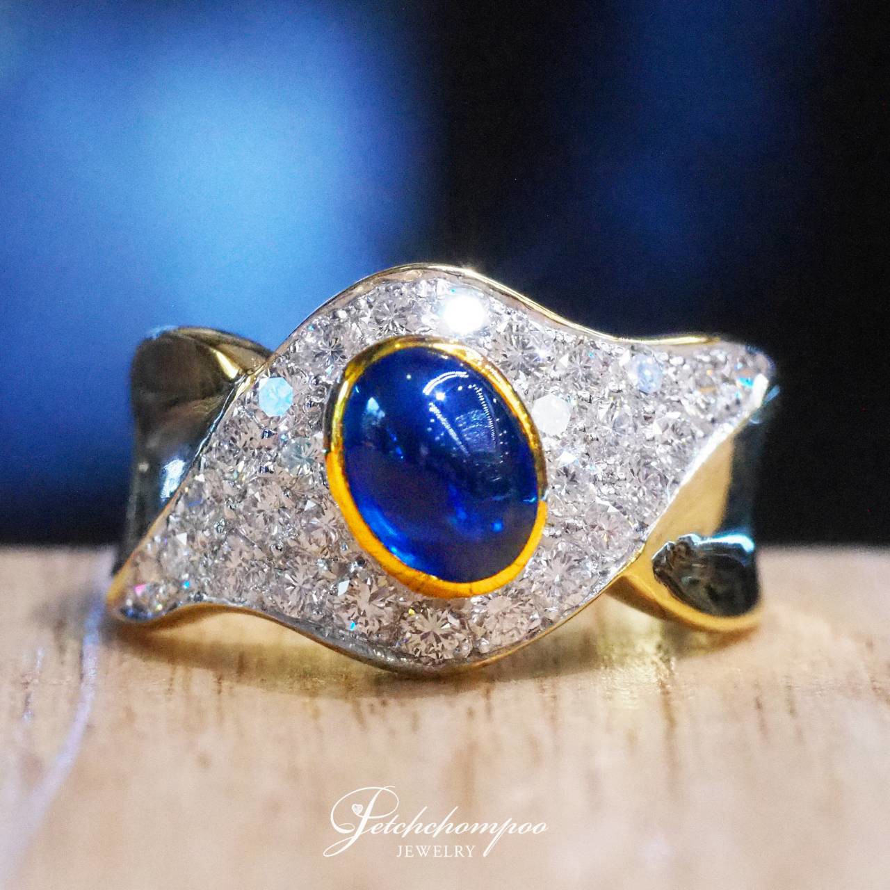 [31066] 1.00 Carat Cabochon Blue Sapphire Wave Ring  59,000 